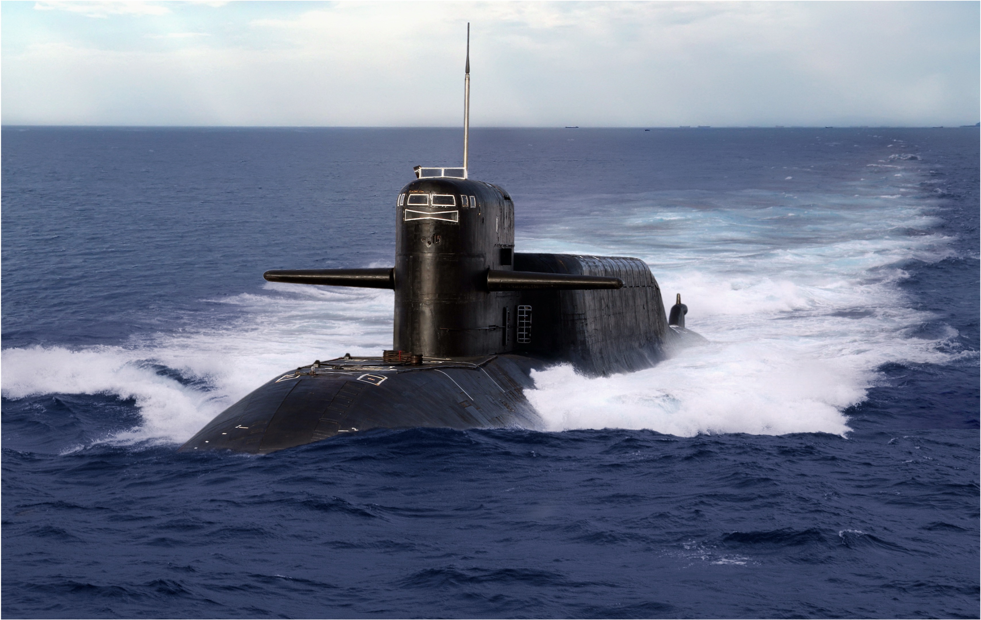 Submarine running on the surface in open ocean